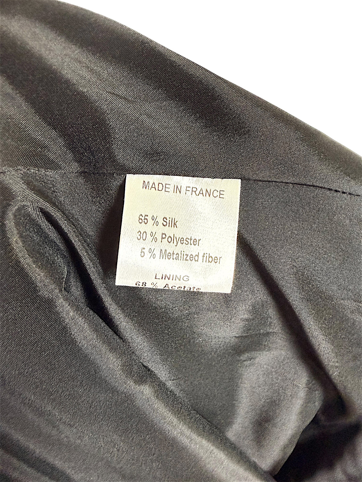 Martin Grant skirt Made in France composition label showing 65 percent silk and metallic jacquard blend