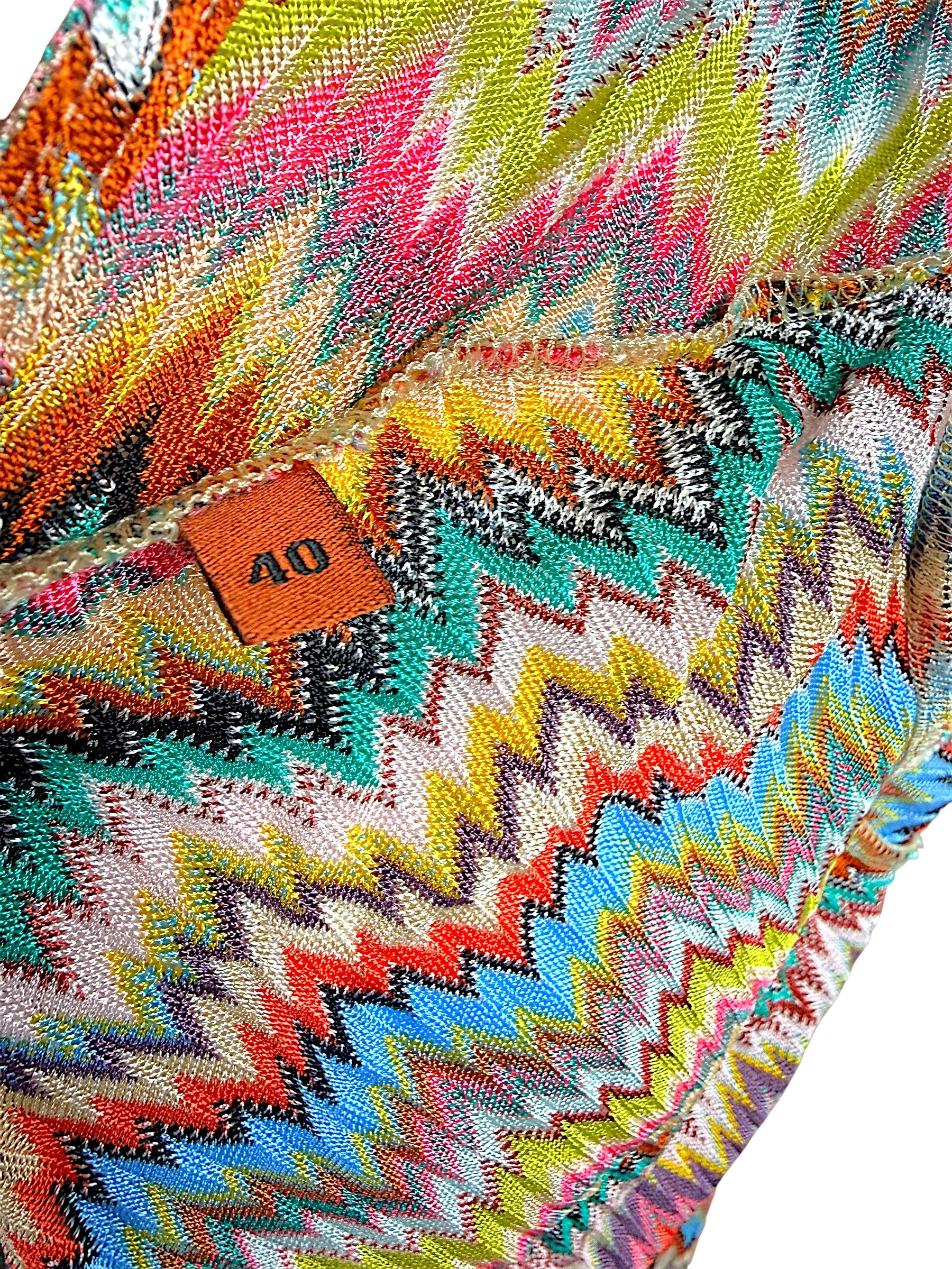 Detail image of Missoni Mare size 40 tag attached to signature multicolor chevron knit fabric.