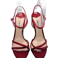 Front view of Miu Miu burgundy satin platform sandals with open toes, crossed satin straps, ankle closures and branded leather insoles.