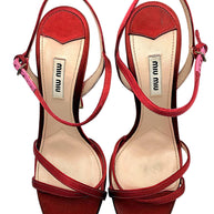 Top view of Miu Miu burgundy satin platform stiletto sandals in EU size 39, featuring branded blush leather insoles, delicate crossover toe straps and adjustable ankle buckles.