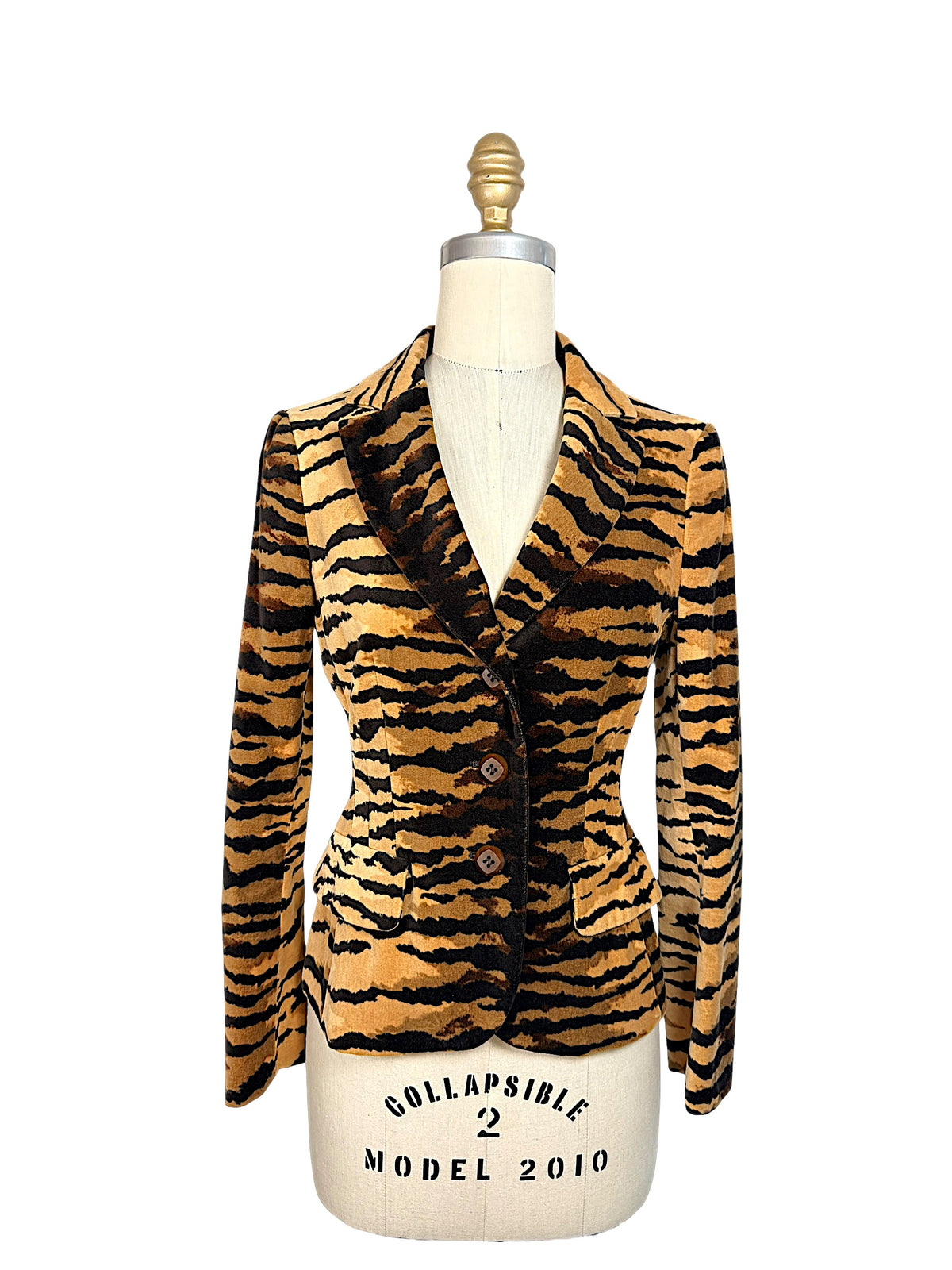 Front view of Moschino Cheap and Chic tiger-striped velvet blazer with fitted waist, notched lapels and three-button closure.