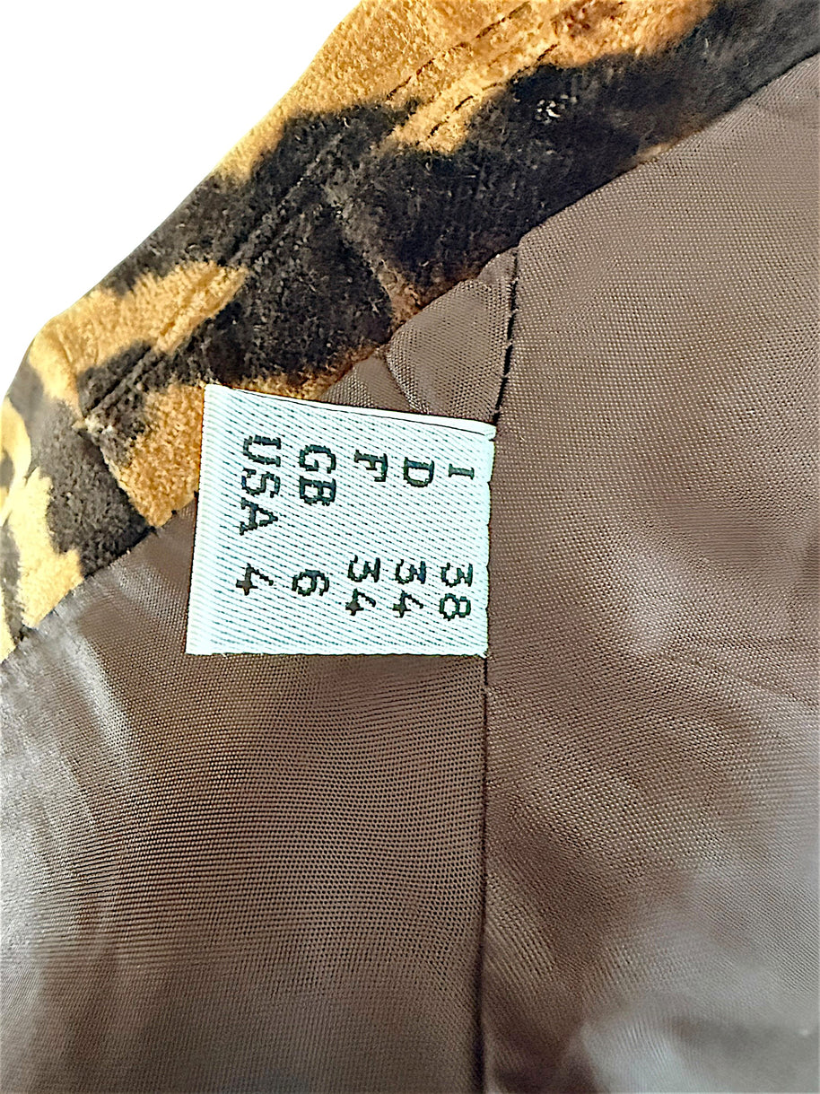 Moschino Cheap and Chic blazer size label showing Italian 38, French 34, UK 6 and US 4 sizing.