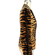 Side profile of Moschino Cheap and Chic brown and black tiger-striped velvet blazer with long sleeves and buttoned cuff.