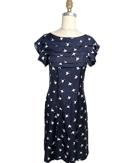 Nina Ricci navy silk dress with ivory swallow bird print and layered ruffle bodice detail, front full view, size FR 36.