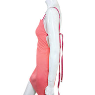 Off-White SS22 coral mini dress side profile showing open back and long pink leather straps