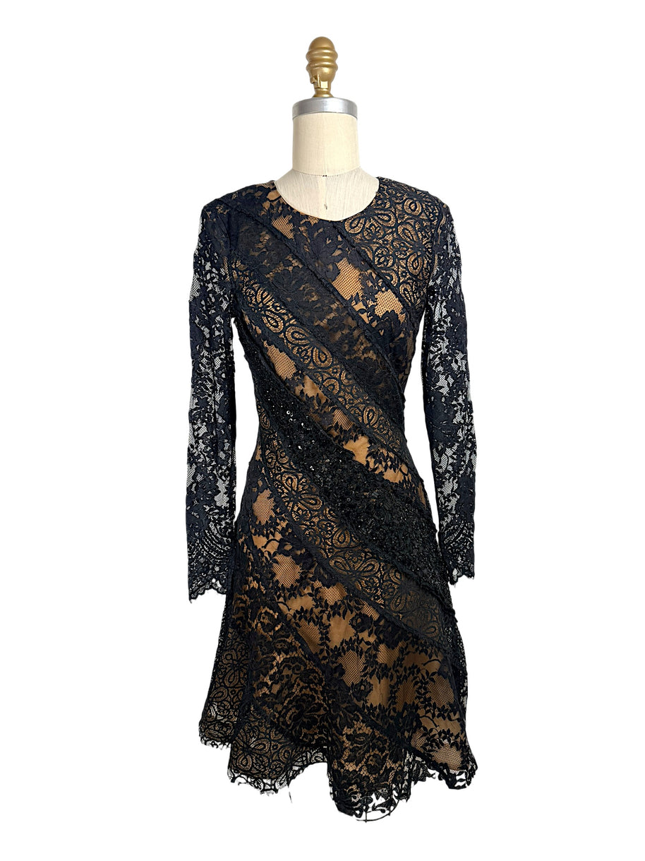 Oscar de la Renta 2014 runway lace dress front view black lace nude lining