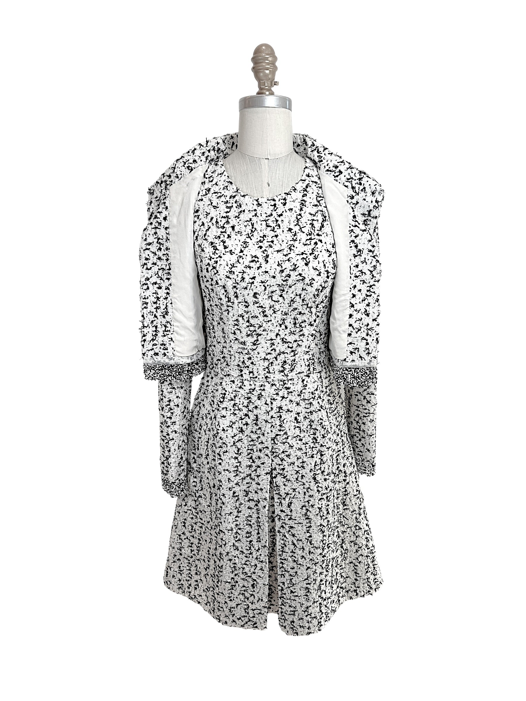 Oscar de la Renta 2015 runway jacket worn open showing matching tweed dress set black white