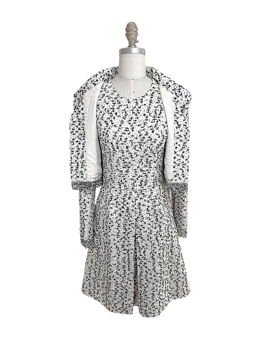 Oscar de la Renta 2015 runway jacket worn open showing matching tweed dress set black white