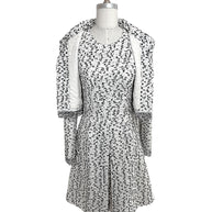 Oscar de la Renta 2015 runway jacket worn open showing matching tweed dress set black white