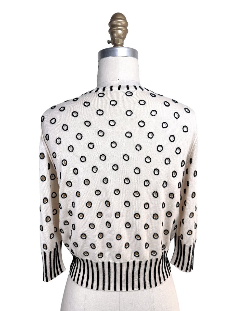 Back view of Oscar de la Renta ivory sweater with black beaded polka dot embellishment throughout