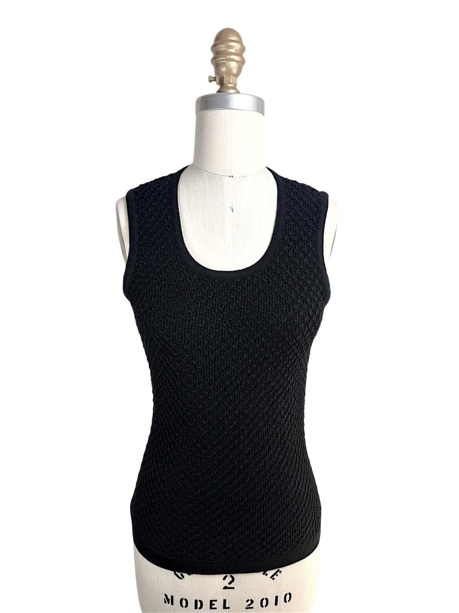 Front view of Oscar de la Renta black textured wool knit sleeveless shell top on mannequin