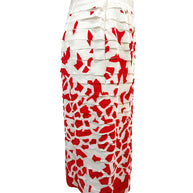 Right side view of Oscar de la Renta ivory and coral red layered silk pencil skirt with textured appliqué finish