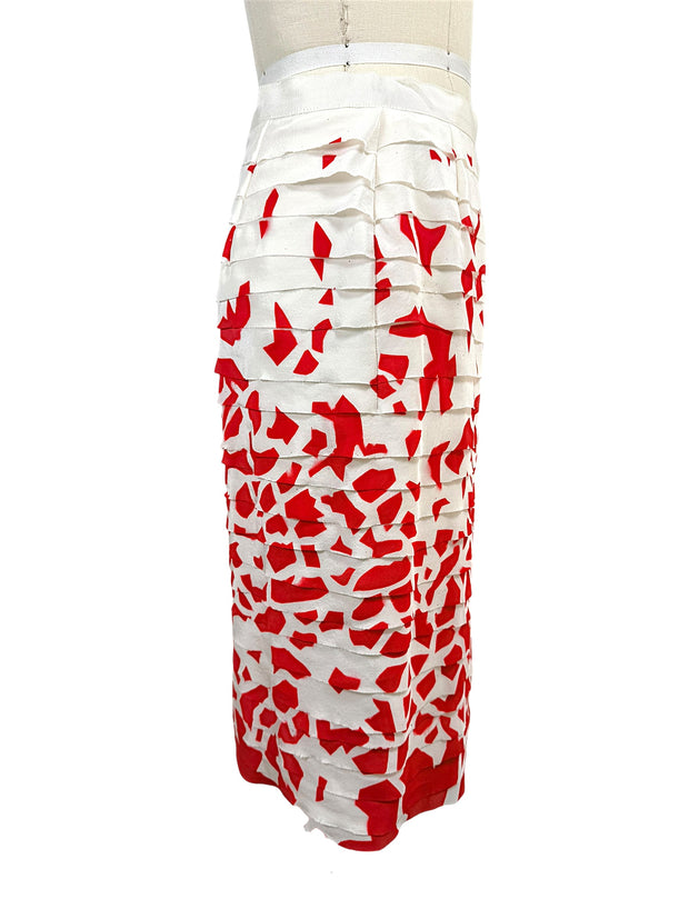 Right side view of Oscar de la Renta ivory and coral red layered silk pencil skirt with textured appliqué finish