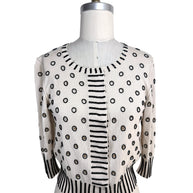 Oscar de la Renta ivory cardigan sweater with black beaded polka dot embroidery and striped trim front view