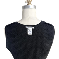 Oscar de la Renta knit shell interior label showing XS size and Made in Italy tag