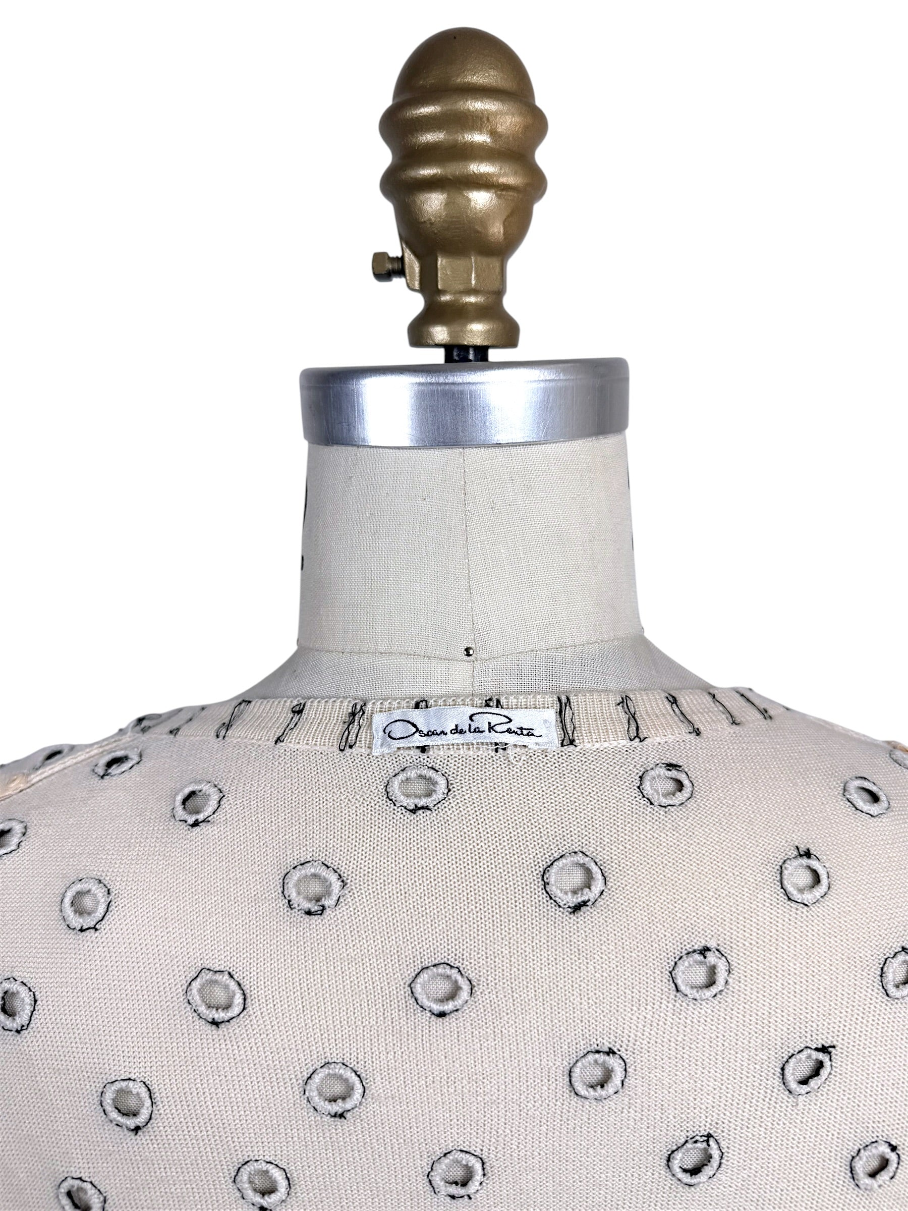 Oscar de la Renta designer label detail on ivory beaded polka dot cardigan sweater