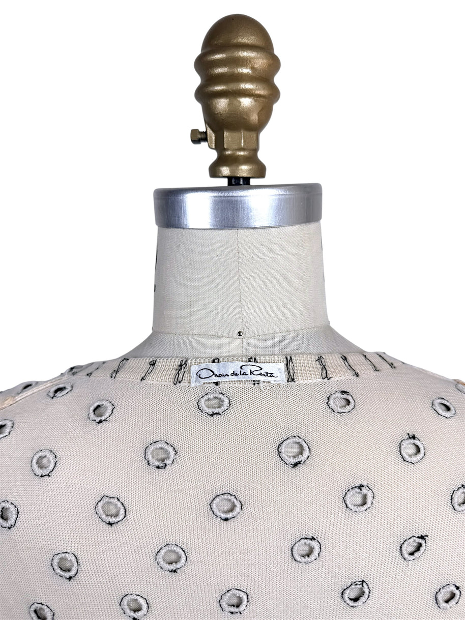 Oscar de la Renta designer label detail on ivory beaded polka dot cardigan sweater