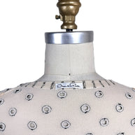 Oscar de la Renta designer label detail on ivory beaded polka dot cardigan sweater