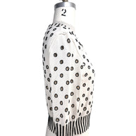 Right side profile of Oscar de la Renta ivory cardigan sweater with black beaded embroidery details