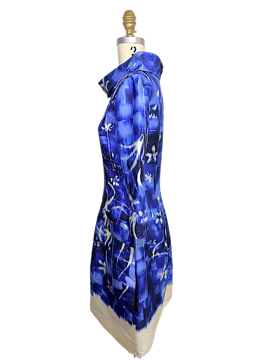 Opposite side profile of the Oscar de la Renta Pre-Fall 2014 abstract print dress showing the structured tailoring and softly flared skirt.