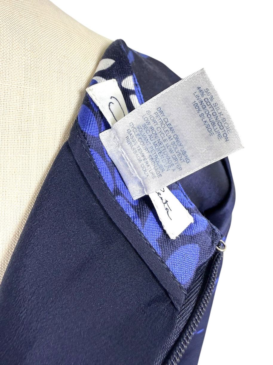 Oscar de la Renta Pre-Fall 2017 dress fabric composition and care tag showing silk wool blend construction