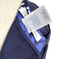 Oscar de la Renta Pre-Fall 2017 dress fabric composition and care tag showing silk wool blend construction