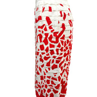 Side profile of vintage Oscar de la Renta ivory silk pencil skirt featuring red abstract print and layered appliqué detailing