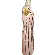 Left side profile of an Oscar de la Renta Resort 2014 blush pink sleeveless dress showing its tailored fit, waist seam, and softly flared skirt.