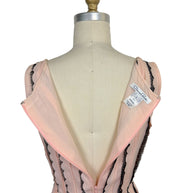 Interior view of the Oscar de la Renta Resort 2014 dress displaying the designer label, hidden zipper, and fully lined construction.
