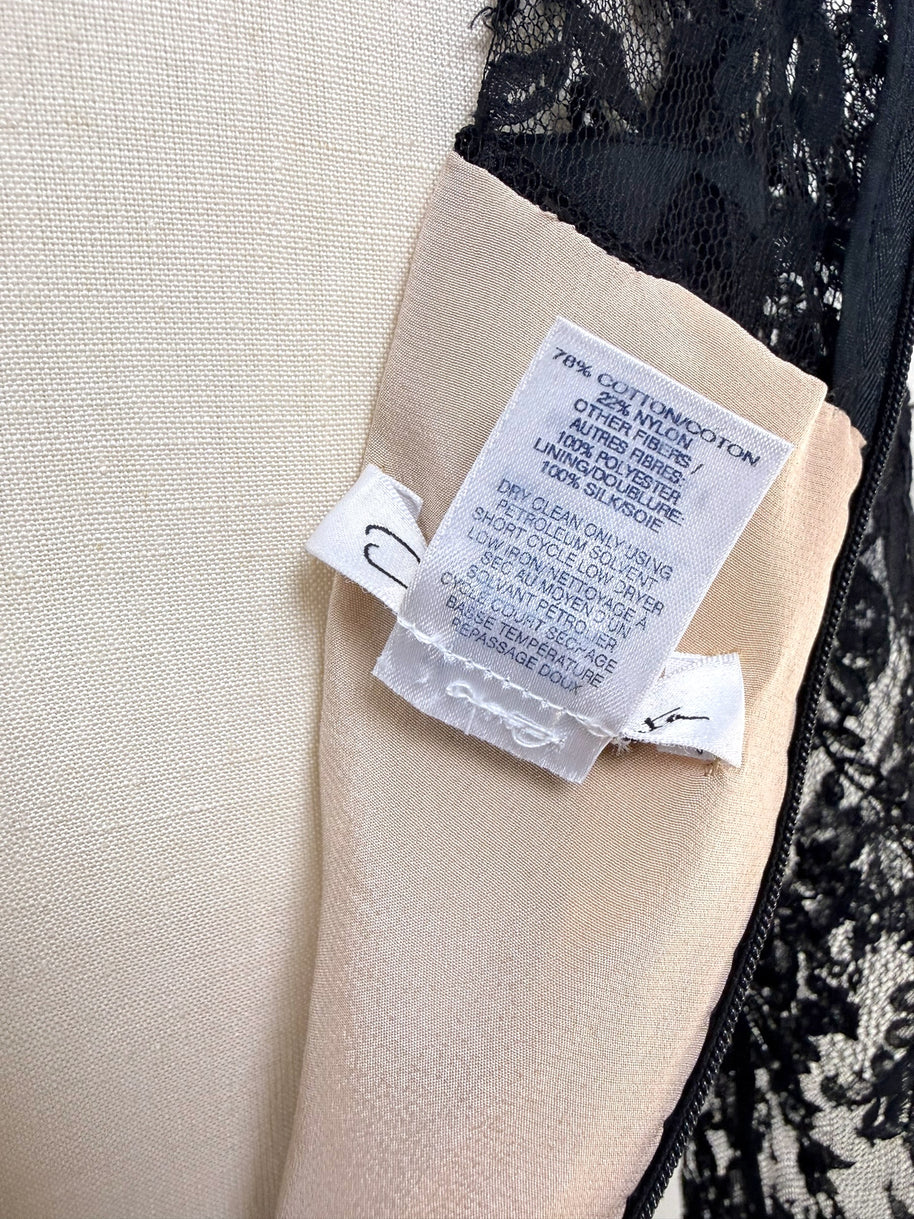 Close-up of Oscar de la Renta Resort 2018 dress composition and care tag with fabric details