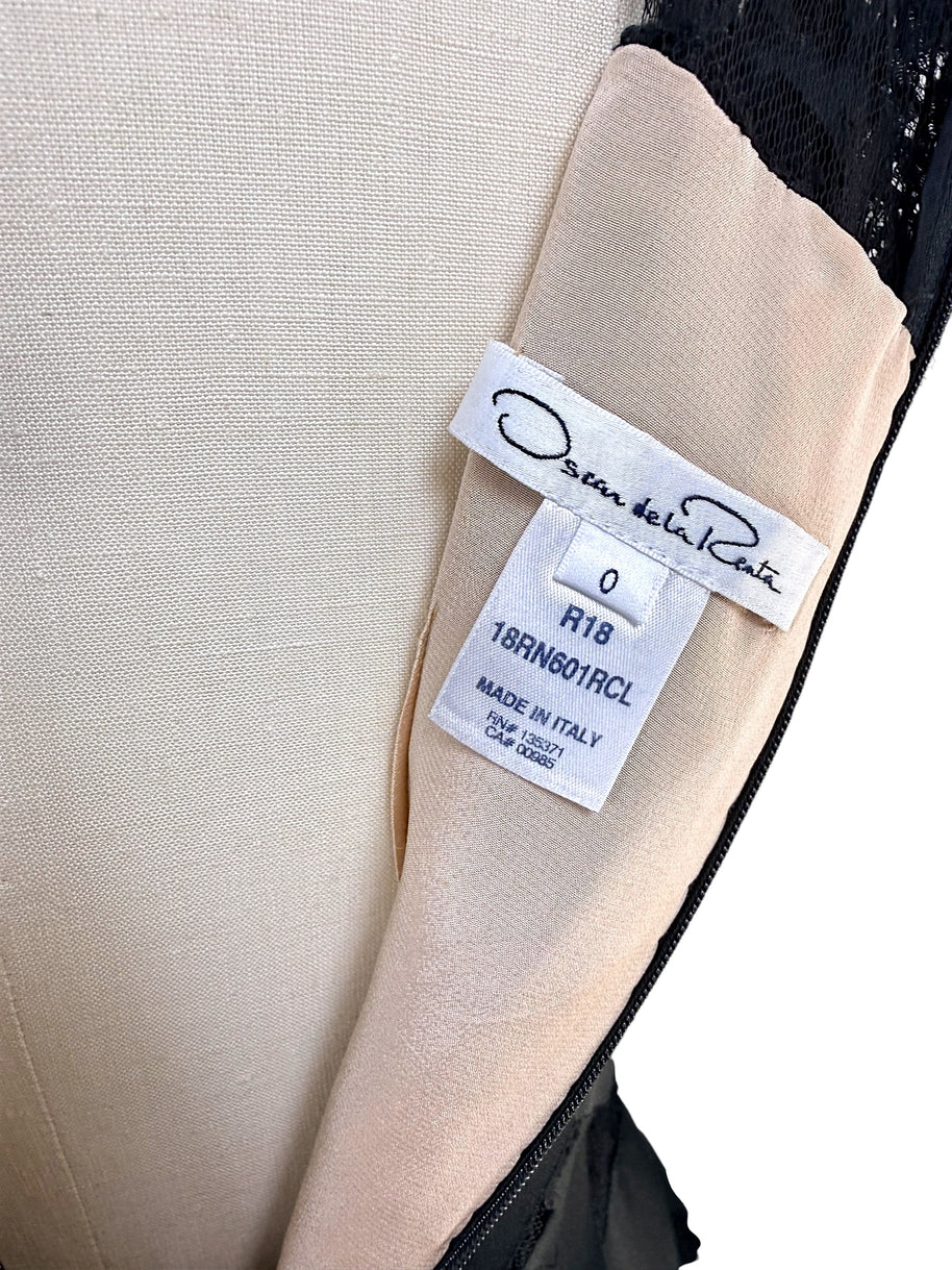 Close-up of Oscar de la Renta Resort 2018 dress size and production label made in Italy