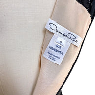 Close-up of Oscar de la Renta Resort 2018 dress size and production label made in Italy