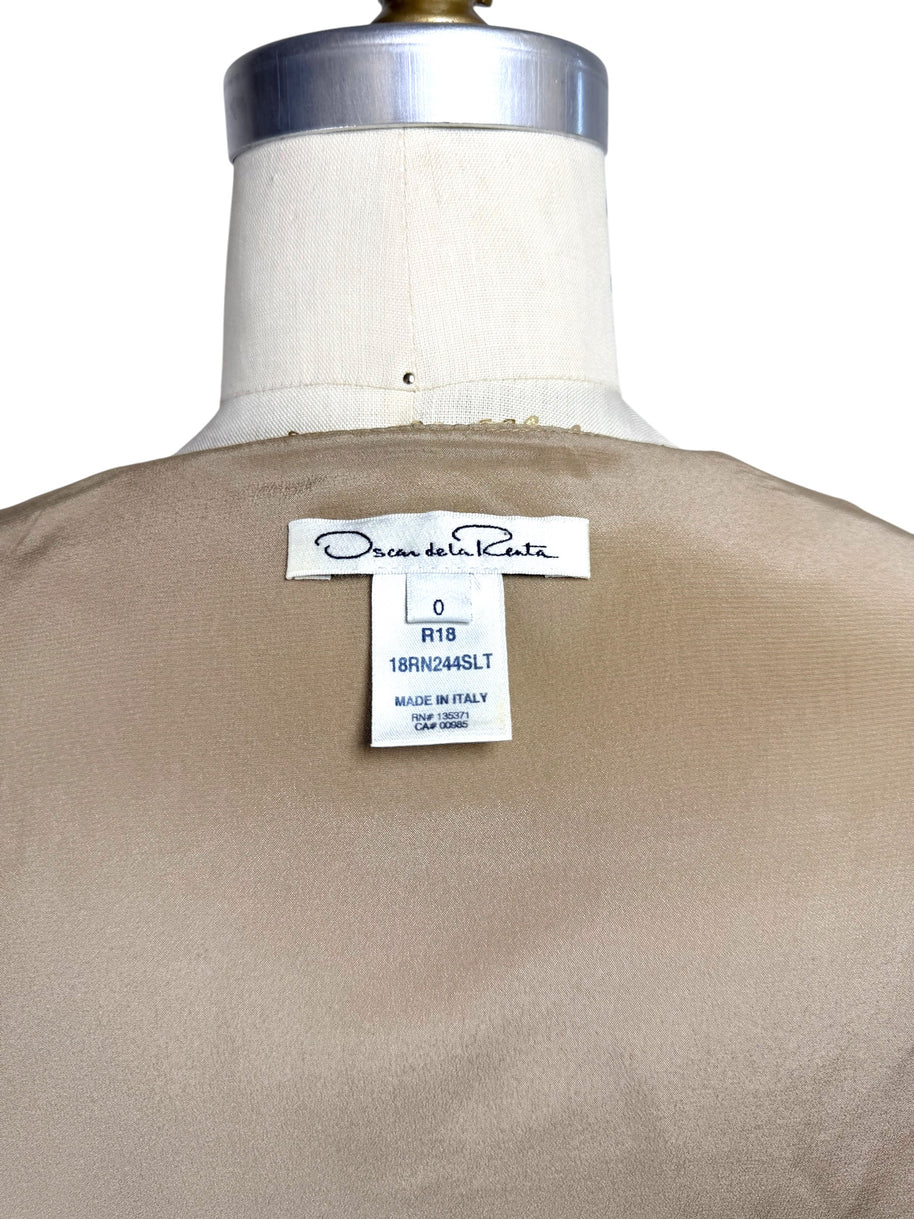 Close-up of Oscar de la Renta Resort 2018 dress interior size and production label