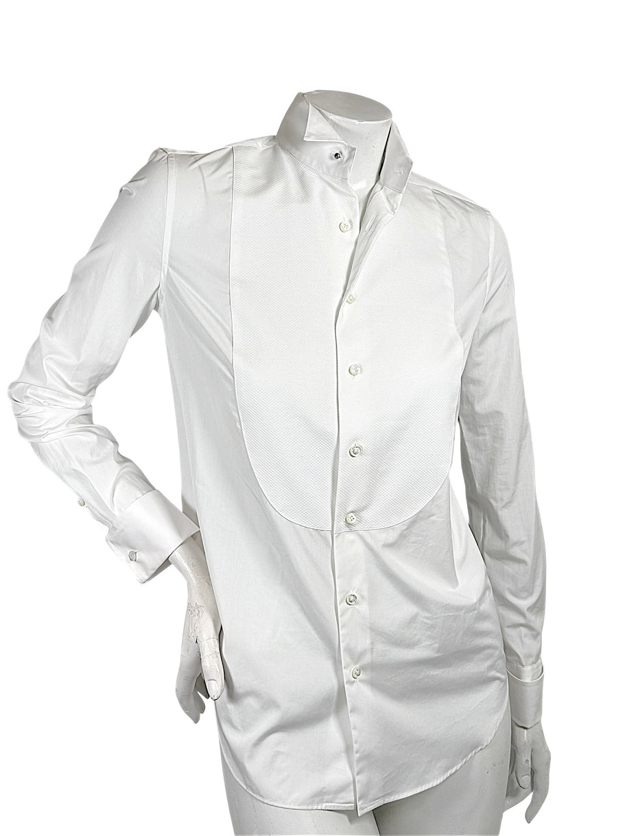 Angled front view of Ralph Lauren Purple Label women's white tuxedo shirt with elongated piqué bib, fitted silhouette and formal collar.