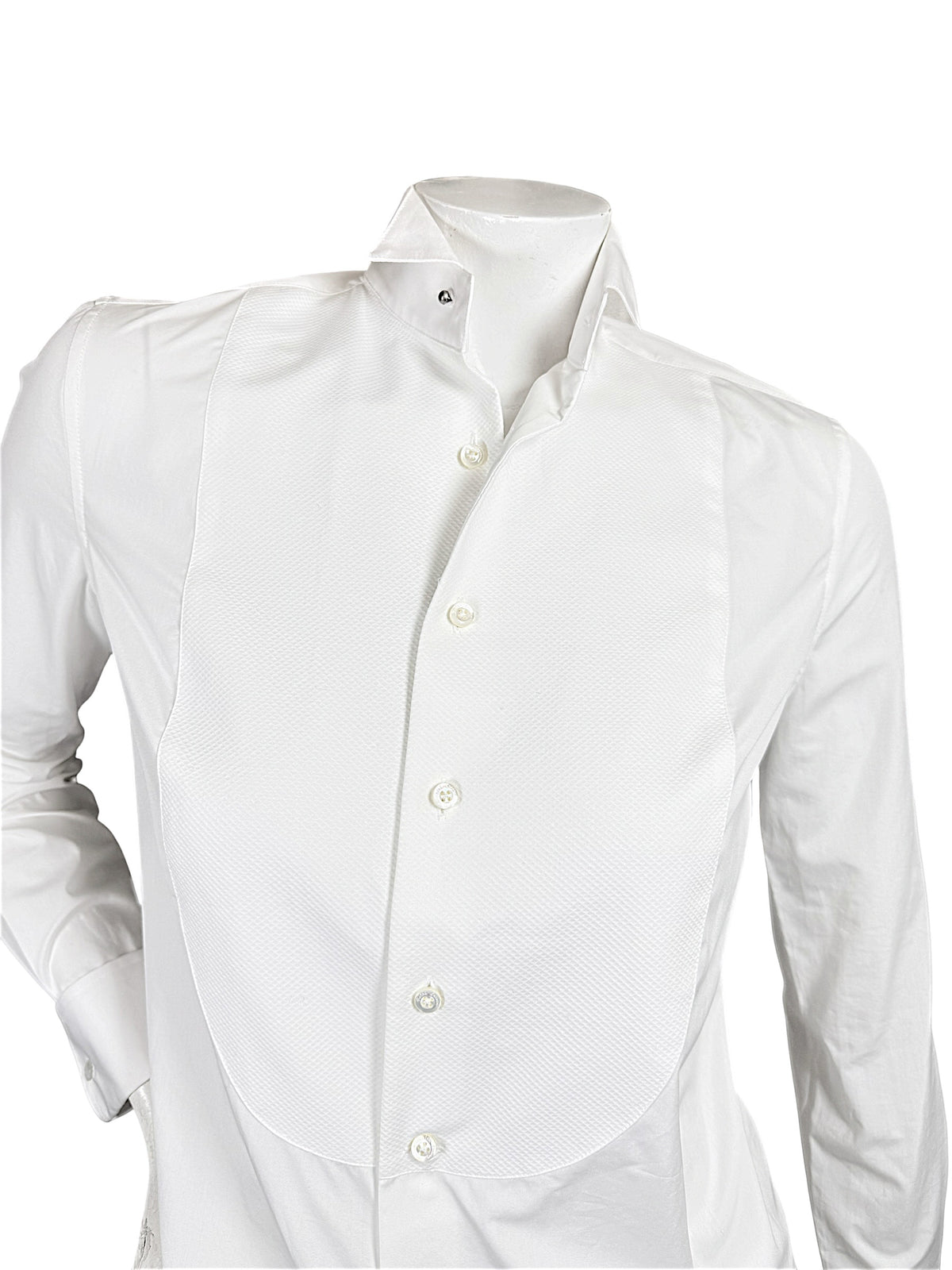 Close-up of Ralph Lauren Purple Label white tuxedo shirt showing the textured piqué bib, formal wingtip collar and front button closure.