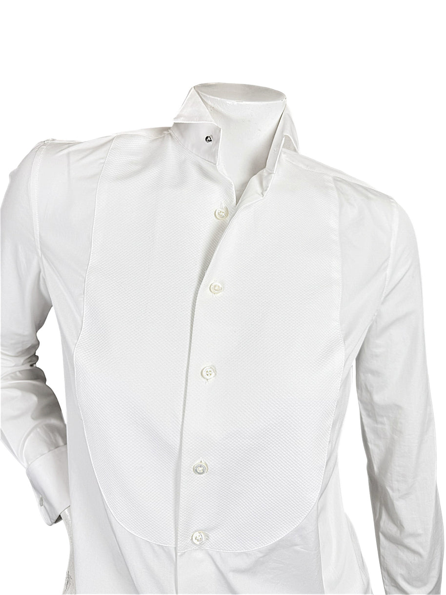 Close-up of Ralph Lauren Purple Label white tuxedo shirt showing the textured piqué bib, formal wingtip collar and front button closure.