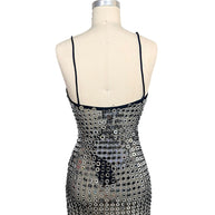 Back view of Retrofête Maddy black mesh mini dress with silver mirrored disc embellishments and low back