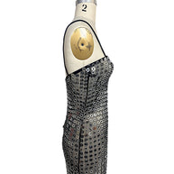 Side view of Retrofête Maddy mini dress with silver mirrored disc embellishments and thin black straps