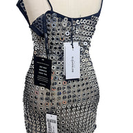 Back detail of Retrofête Maddy XS mini dress showing closure, silver embellishments and original retail hang tags