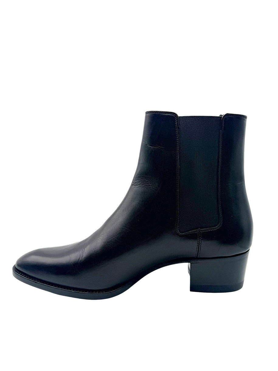 Opposite side profile of Saint Laurent Paris black leather Chelsea ankle boot showing elastic gusset, smooth leather upper and low heel.
