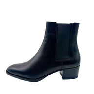 Reverse side view of Saint Laurent Paris women's black leather Chelsea ankle boot with almond-shaped toe and elastic side panel.