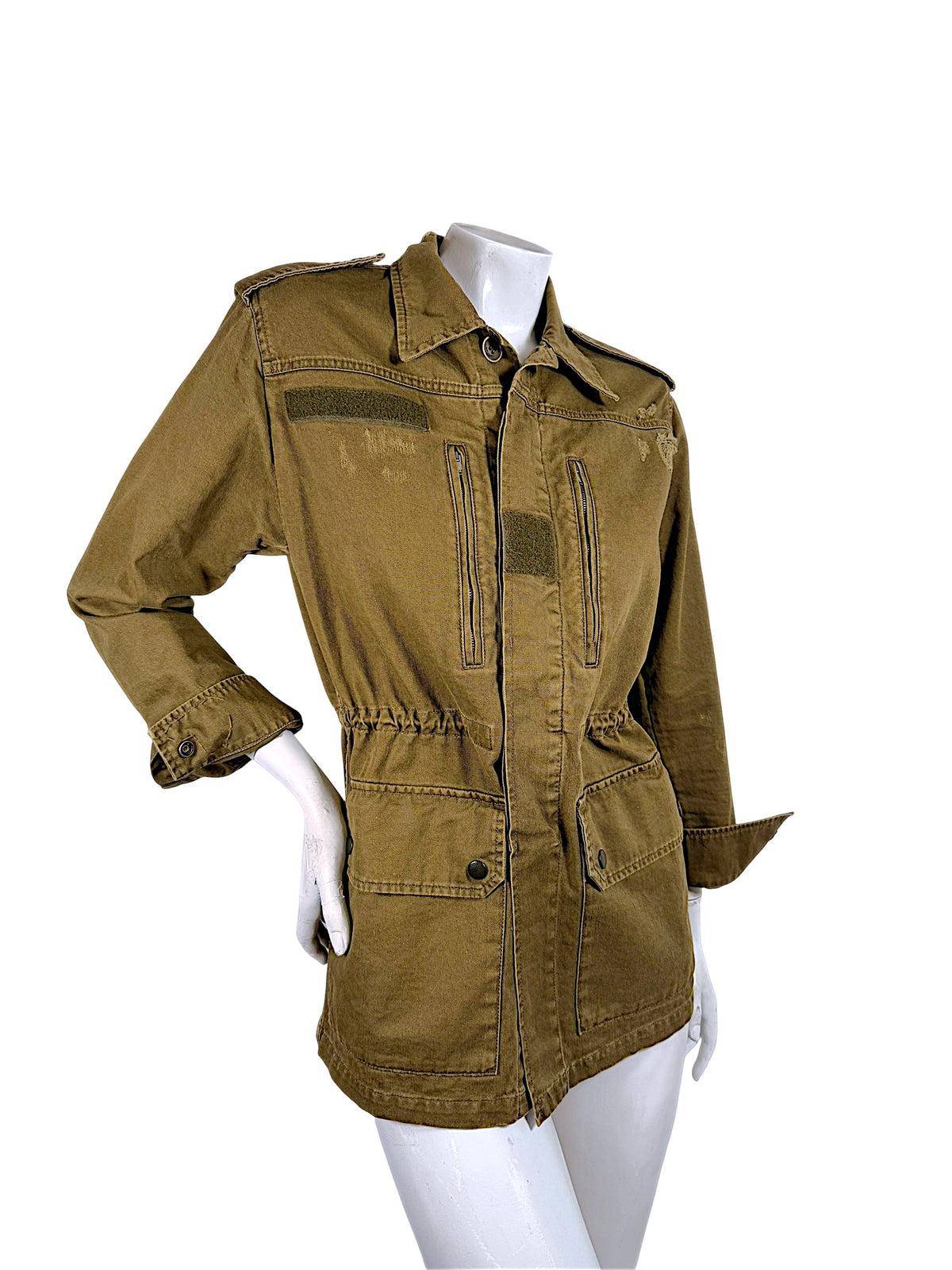 Three-quarter front view of Saint Laurent olive green military utility jacket featuring gathered waist and distressed cotton twill