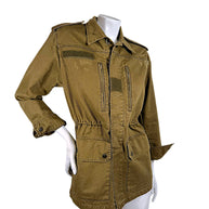 Three-quarter front view of Saint Laurent olive green military utility jacket featuring gathered waist and distressed cotton twill