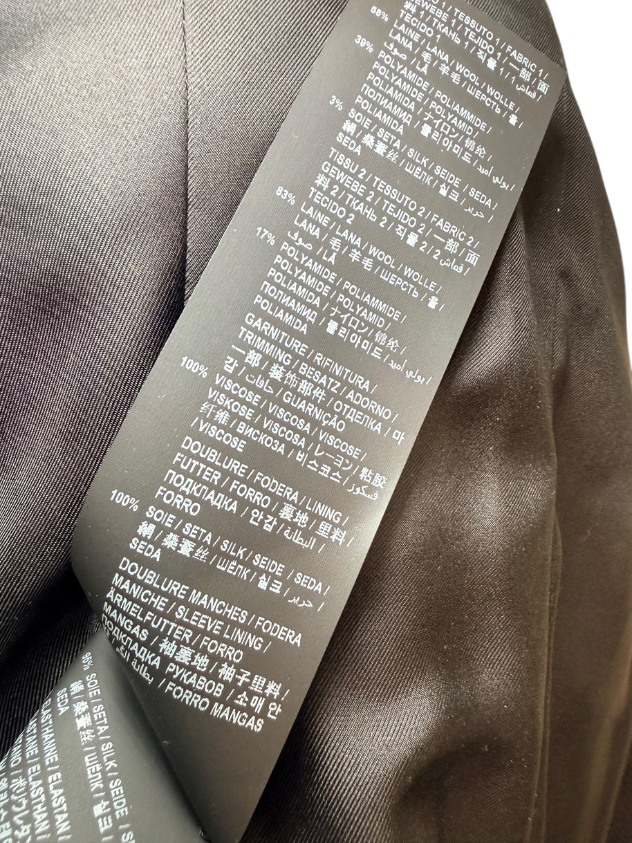 Saint Laurent green tweed jacket care and composition label detail