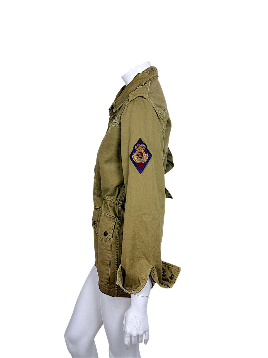 Side view of Saint Laurent olive green military jacket featuring colorful embroidered crowned SL crest patch on upper sleeve