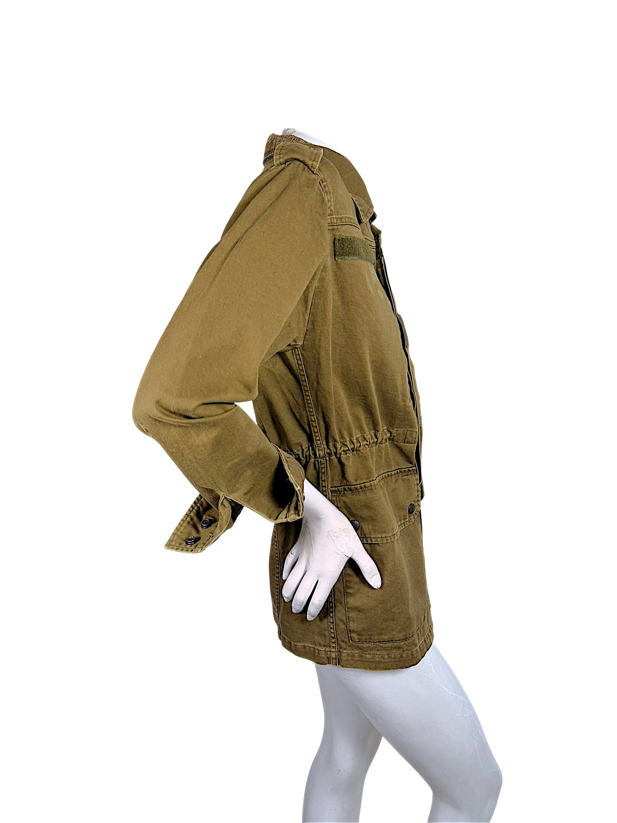 Side profile of Saint Laurent Fall 2018 olive green field jacket showing sleeve construction, adjustable waist and flap pocket