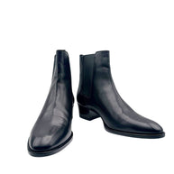 Saint Laurent Paris women's black leather Chelsea ankle boots size EU 38, front angled view showing almond toes and low block heels.