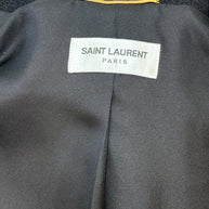 Saint Laurent Paris designer label inside green tweed jacket
