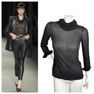 Saint Laurent Spring Summer 2014 Runway Look 19 alongside the documented black sheer silk blouse by Hedi Slimane