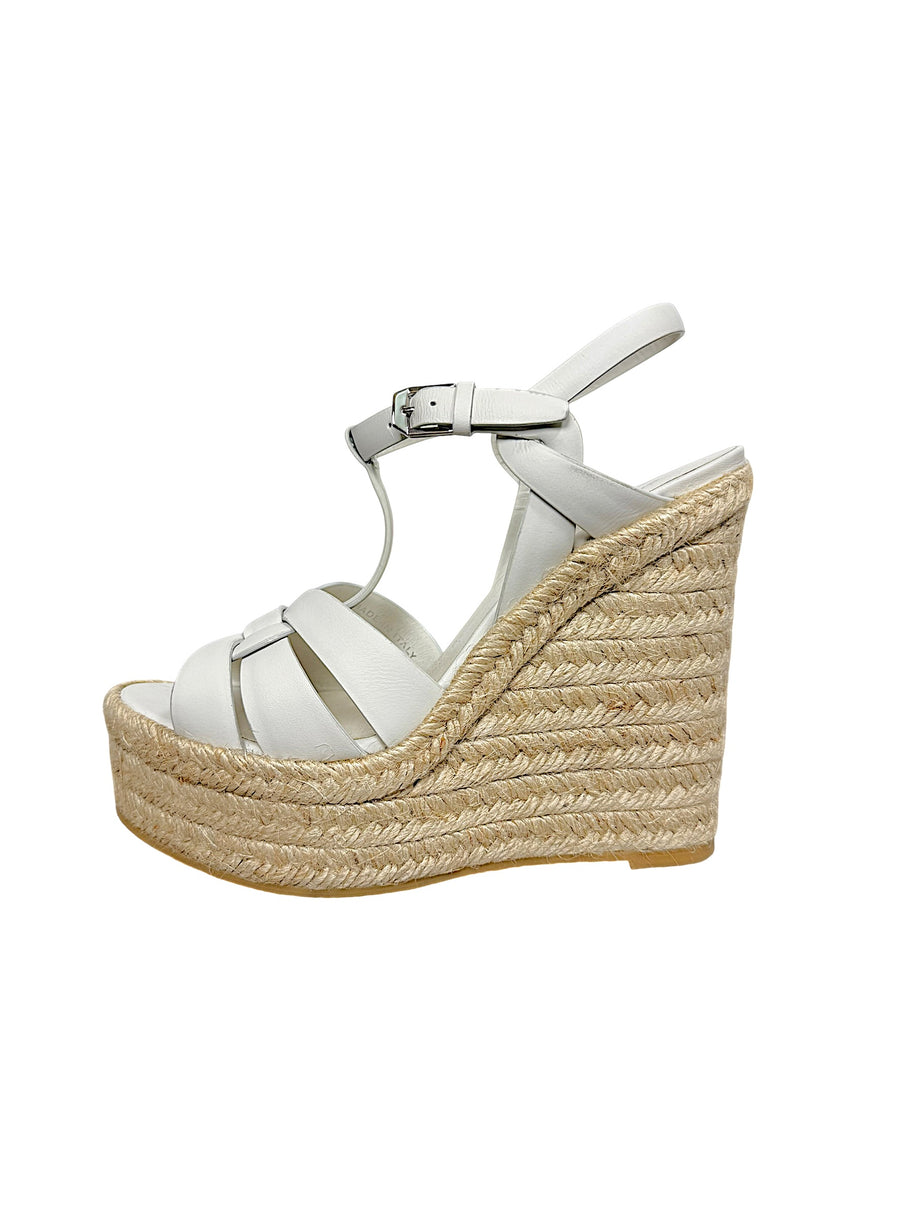 Inner side view of Saint Laurent Tribute white leather platform wedge sandal showing layered natural jute espadrille construction